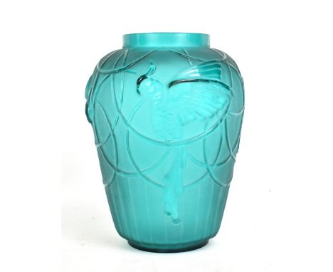 SABINO; an Art Deco green glass vase decorated in relief with parrots and scrolls, signed 'Sabino France' to base, height 21.