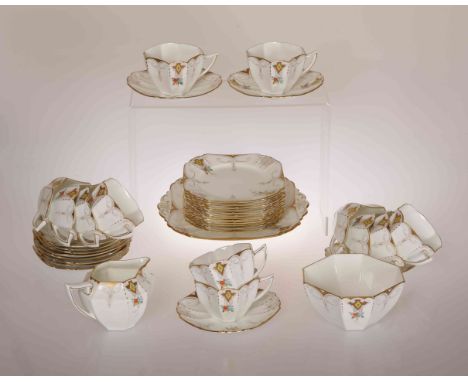 SHELLEY, A QUEEN ANNE SHAPE TEA SERVICE, comprising twelve cups and saucers, twelve tea plates, sandwich plate, cream jug and