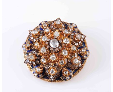 A VICTORIAN DIAMOND, ENAMEL AND GOLD BROOCH, CIRCA 1860, the circular mount, with chased detail to the edge and blue enamel d