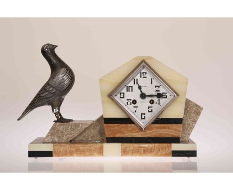 AN ART DECO MARBLE MANTEL CLOCK, signed PECHEUX MANTES, the silvered lozenge shaped dial with Arabic numerals, the case surmo