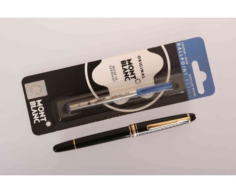 A MONT BLANC BALL POINT PEN, with spare refill. (2)