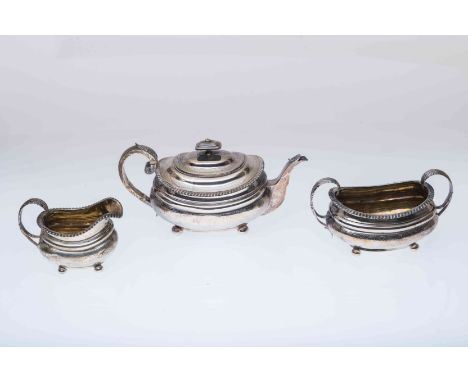 A SCOTTISH SILVER THREE PIECE TEA SERVICE, George Fenwick, Edinburgh 1817, comprising teapot, cream jug and two-handled sugar