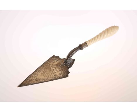 A VICTORIAN SILVER AND IVORY HANDLED PRESENTATION TROWEL, maker WW (over) H, Sheffield 1875, the ivory handle carved as a rop