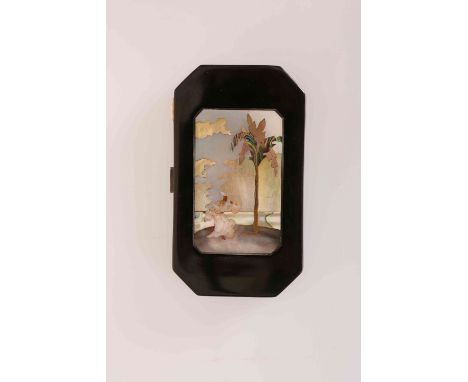 A FRENCH SILVER GILT AND BLACK ENAMEL COMPACT, CIRCA 1920'S, inlaid with mother of pearl, depicting an eastern gentleman by a