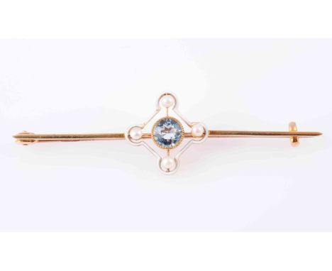 A LATE VICTORIAN AQUAMARINE, ENAMEL AND SEED PEARL BROOCH, CIRCA 1890, the circular mixed-cut aquamarine, millegrain collet s