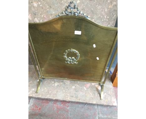 A BRASS FIRE SCREEN