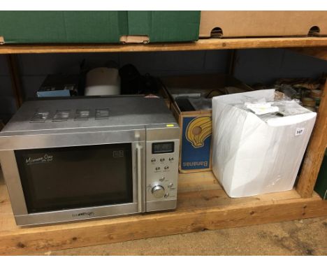 Shelf of assorted including a microwave