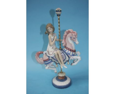 A boxed Lladro Carousel figure
