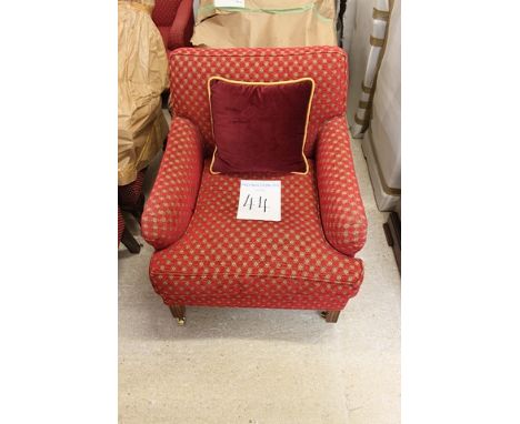A pair of upholstered red repeating pattern armchair square back fixed cushion and loose pad seat mounted on solid wood frame