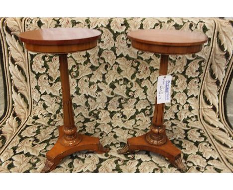 A pair of Empire style mahogany lamp table 400mm diameter mounted on single pedestal carved acanthus on  base with claw feet 