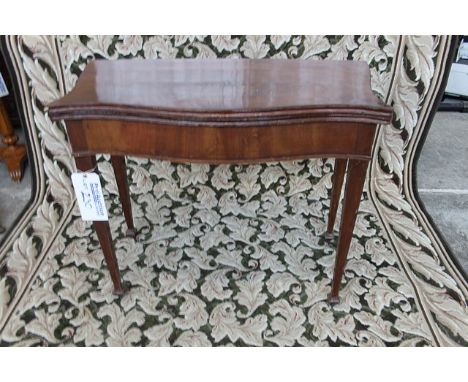 A mahogany folding card table on four square tapering legs 900mm x 920mm x 710mm