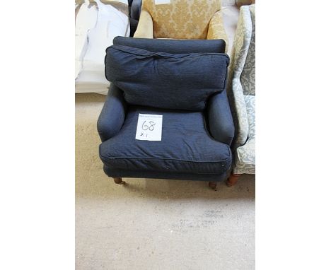 A blue arm chair loose cushion front castors 600mm x 780mm