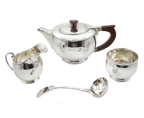 Three piece tea set by Charles S Green &amp; Co Ltd, Birmingham 1972 and a silver suace ladle, Fiddle pattern by Deakin &amp;