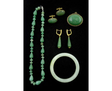 Collection of jade jewellery including bangle, necklace, pair of earrings, cufflinks and broochClick here to view further ima