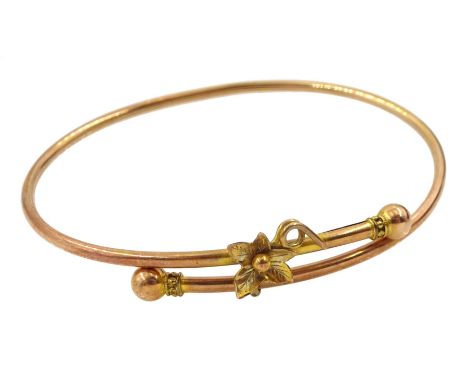 Early 20th century rose gold bangle with leaf decoration, makers mark M &amp; J, stamped 9c, in velvet and silk lined boxClic