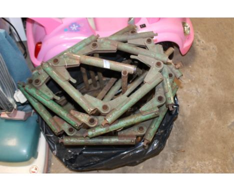 A VINTAGE ROLL UP ESCAPE LADDER