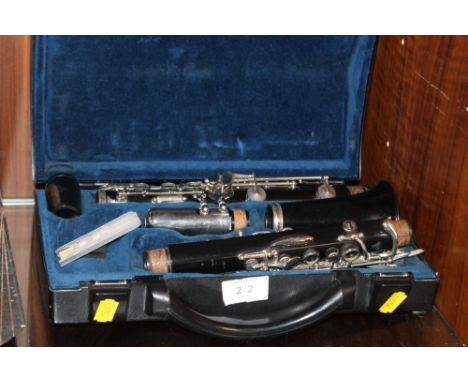 A CASED BOOSEY AND HAWKES OF LONDON CLARINET