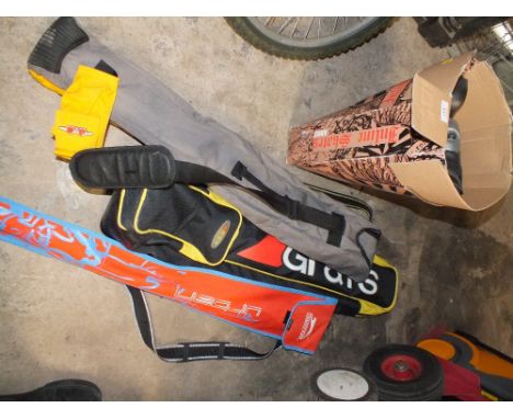 A QUANTITY OF HOCKEY STICKS PLUS A BOX OF KNEE PADS ETC TO IN ROLLER SKATES