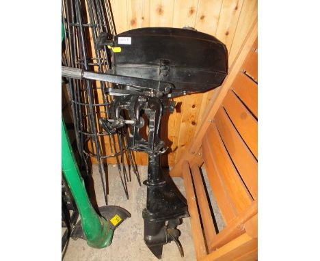 A MERCURY BOAT ENGINE AND PROPELLER