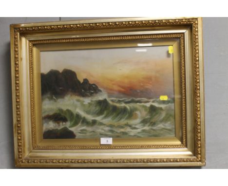 A GILT FRAMED AND GLAZED SEASCAPE OIL PAINTING