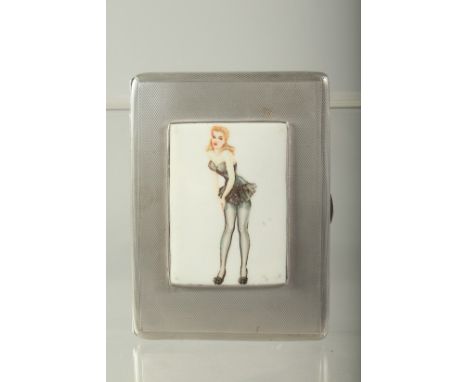 AN ENGINE TURNED SILVER CIGARETTE CASE. 11.5cms x 8cms. Birmingham 1984. Weight 221 grams. The lid with an oval glamour model