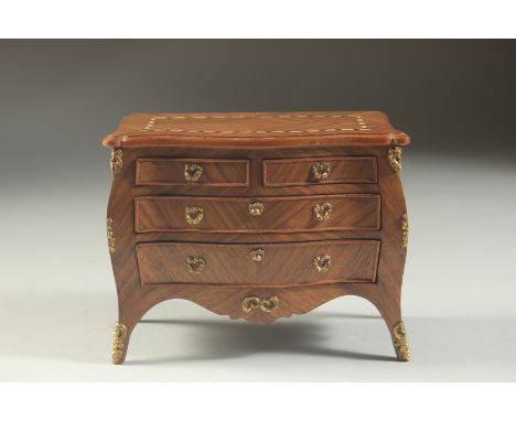 A SUPERB QUALITY LOUIS XVI DESIGN MINIATURE BOMBE COMMODE in kingwood with crossbanded inlaid top, two short and two long gra