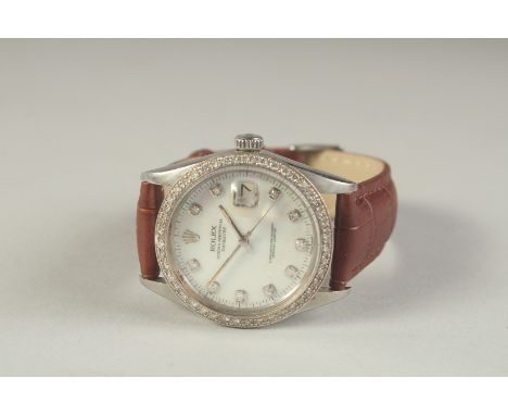 A VERY GOOD ROLEX MOTHER OF PEARL WATCH with diamond bezel and face, boxed.