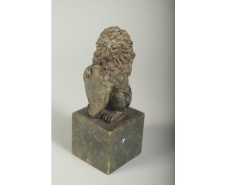A CARVED JADE LION SEAL on a square base. 6ins high.