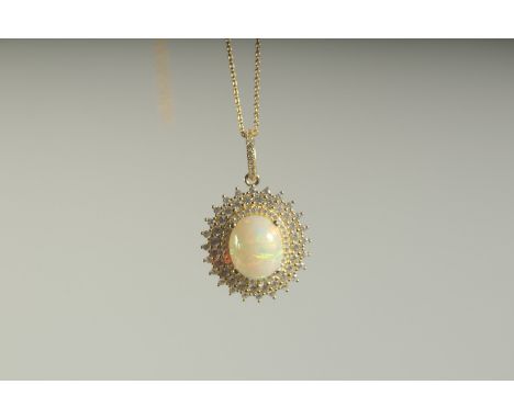 A SILVER GOLD PLATED OPAL PENDANT AND CHAIN, boxed.