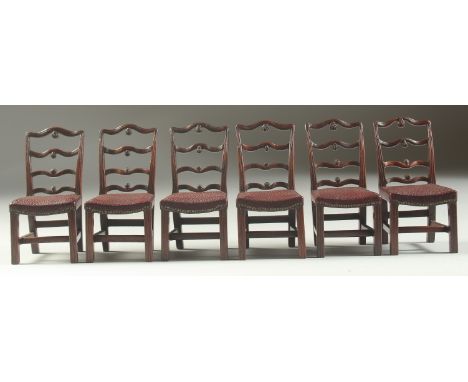 A GOOD SET OF SIX CHIPPENDALE DESIGN MAHOGANY LADDER BACK DINING CHAIRS with padded leather seats. 3.75ins high.