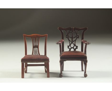 A CHIPPENDALE DESIGN MAHOGANY MINIATURE ARMCHAIR, with drop-in leather seat, on cabriole legs with claw &amp; ball feet and a