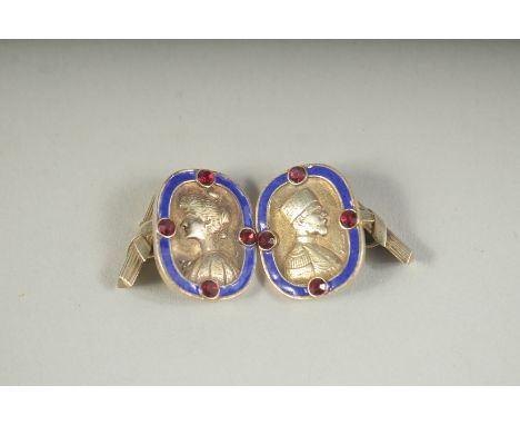 A PAIR OF RUSSIAN SILVER AND ENAMEL CUFFLINKS.