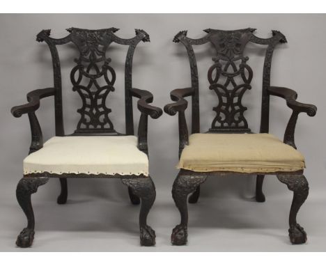 A VERY GOOD PAIR OF IRISH CHIPPENDALE MAHOGANY ARMCHAIRS CIRCA 1860, carved with oak leaves and acorns, flowers and scrolls w