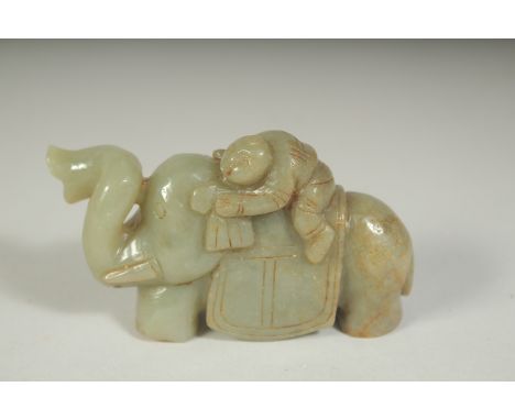 A CARVED JADE ELEPHANT, 3.5ins.