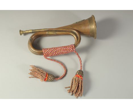 AN ARGYLL AND SUTHERLAND BRASS BUGLE.
