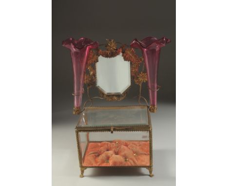 A GOOD CIRCA 1900 FRENCH GILT METAL AND GLASS DRESSING TABLE BOX with mirror, a pair of ruby glass flower vases and a glass b