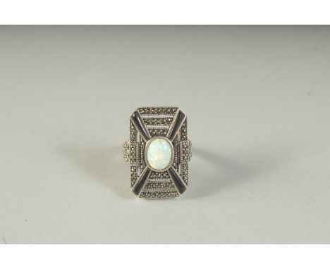 A SILVER ONYX AND OPAL ART DECO STYLE RING, boxed.