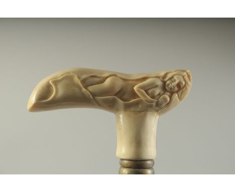 A WALKING STICK WITH CARVED BONE HANDLE "NUDE".