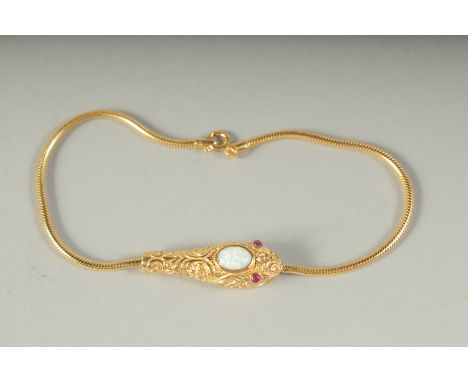 A SILVER GOLD PLATED OPAL SET SNAKE BRACELET, boxed.