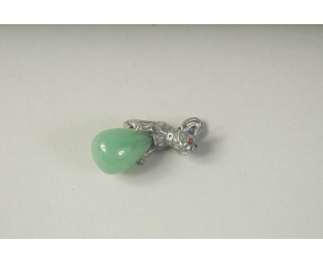 A RUSSIAN SILVER AND JADE DOG PENDANT.