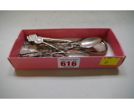 A small group of Oriental silver,&nbsp;to include a Japanese spoon; three Chinese teaspoons; and seventeen cocktail sticks, 1