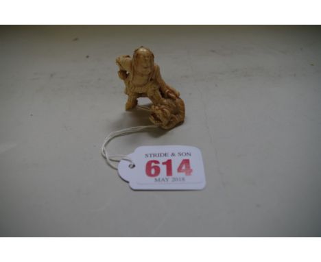 A Japanese carved ivory netsuke,&nbsp;Edo period,&nbsp;depicting a Samurai and tiger, 4.5cm high, (s.d.). 