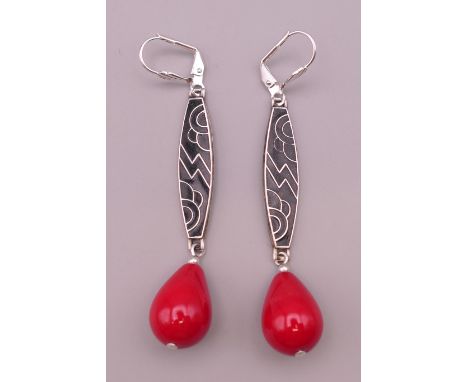 A pair of Art Deco style black enamel earrings.  6 cm high. 