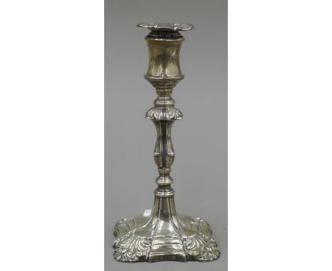 A silver candlestick. 16.5 cm high.