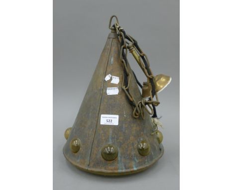 A copper covered Art glass hanging light. 34 cm high.