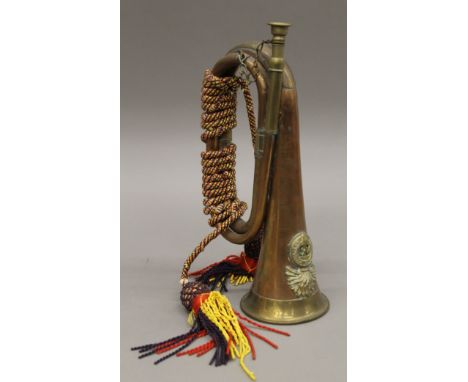 A Royal Welsh Fusiliers brass and copper bugle. 