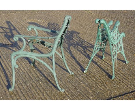 Two pairs of garden bench ends.