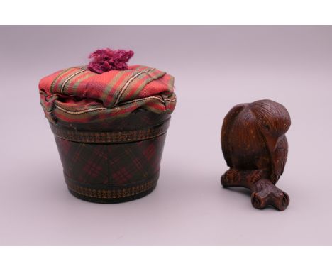 A tartanware box and a netsuke formed as a bird. The former 5.5 cm high.