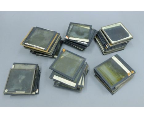 A small collection of glass negatives and magic lantern slides.