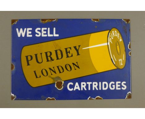 An enamel Purdy sign. 30 cm wide.